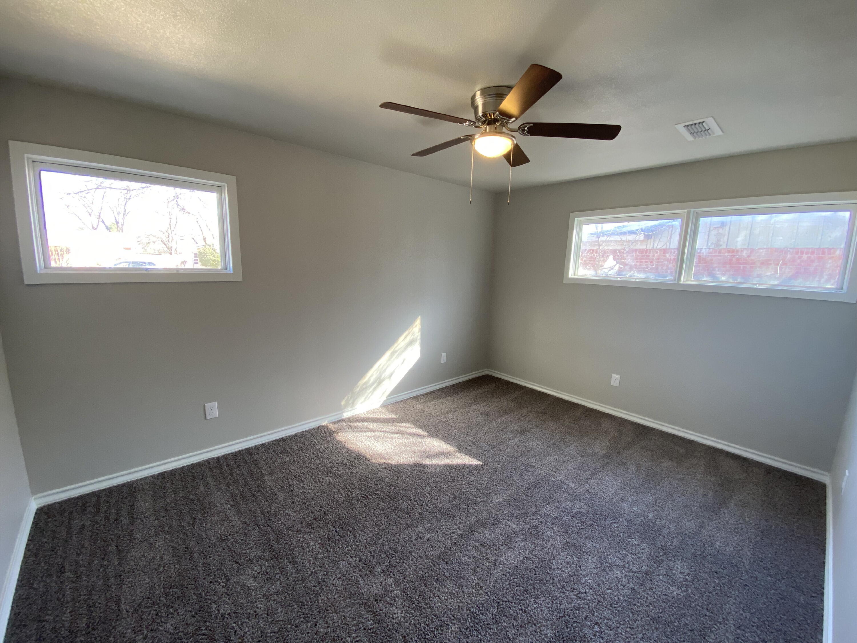 2823 56th Street Lubbock, TX 79413 - Photo 9 of 15 a view of empty room with window