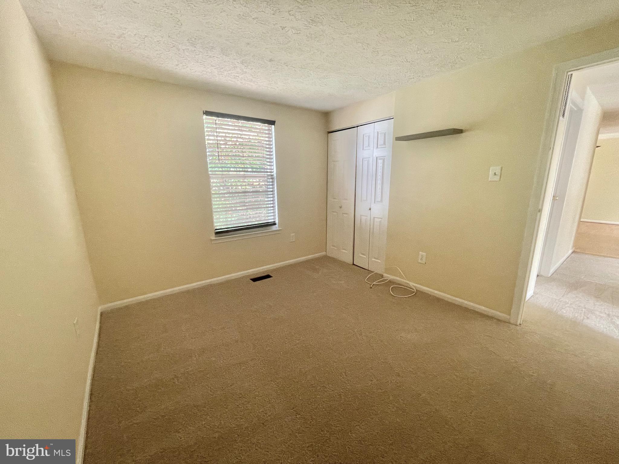 8604 Lawrence Hill Road Perry Hall, MD 21128 - Photo 17 of 38 a view of an empty room with a window