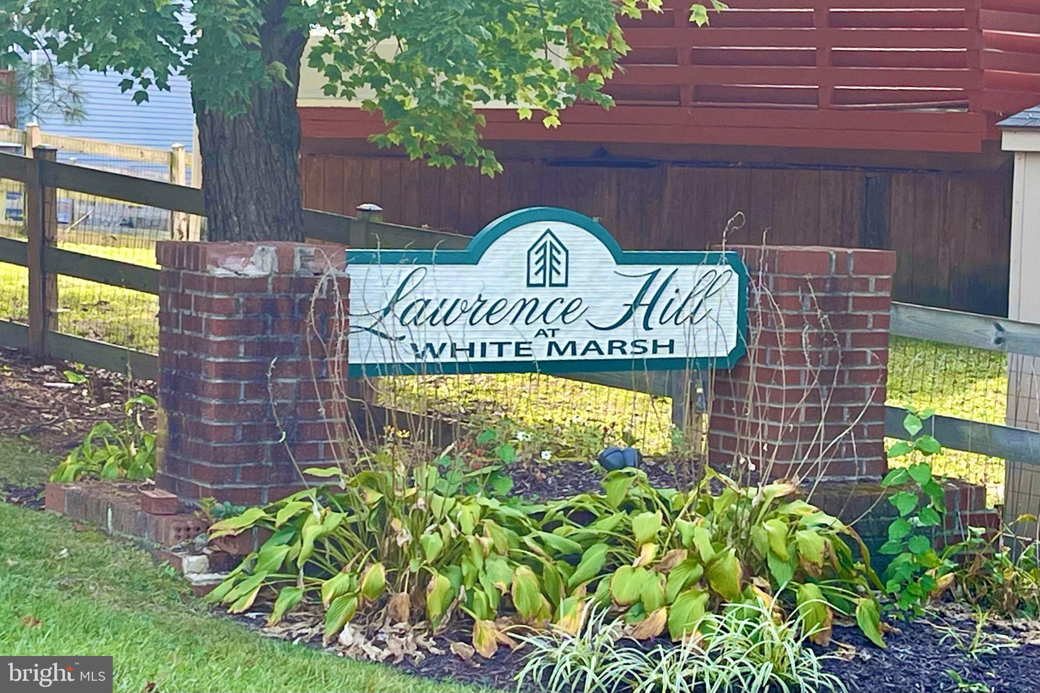 8604 Lawrence Hill Road Perry Hall, MD 21128 - Photo 2 of 38 a sign on the side of a building