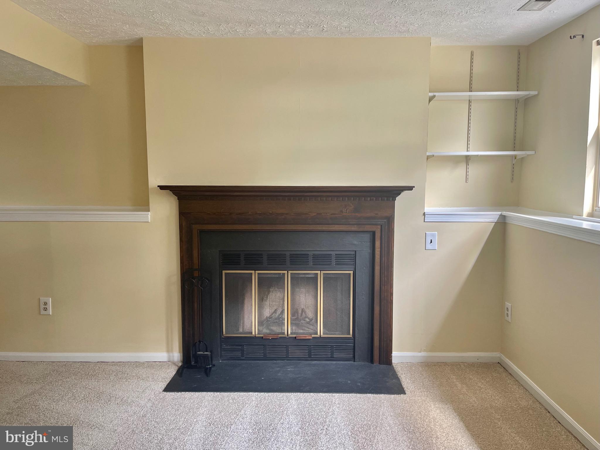 8604 Lawrence Hill Road Perry Hall, MD 21128 - Photo 23 of 38 a living room with a fireplace
