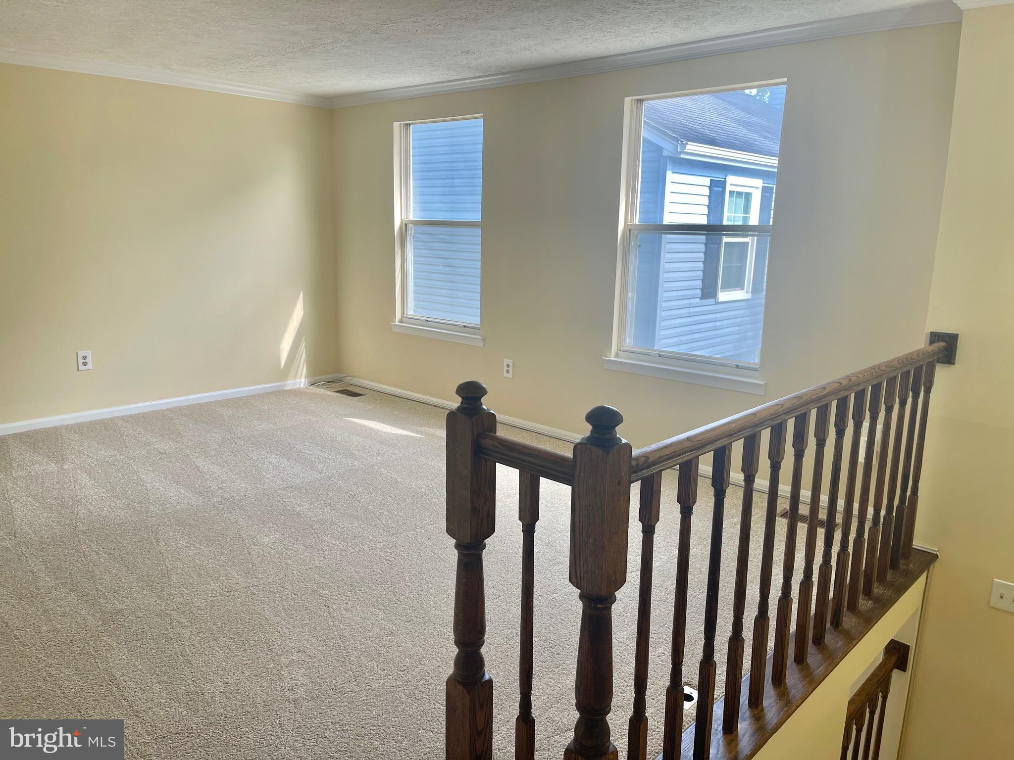 8604 Lawrence Hill Road Perry Hall, MD 21128 - Photo 6 of 38 a view of a hallway with windows