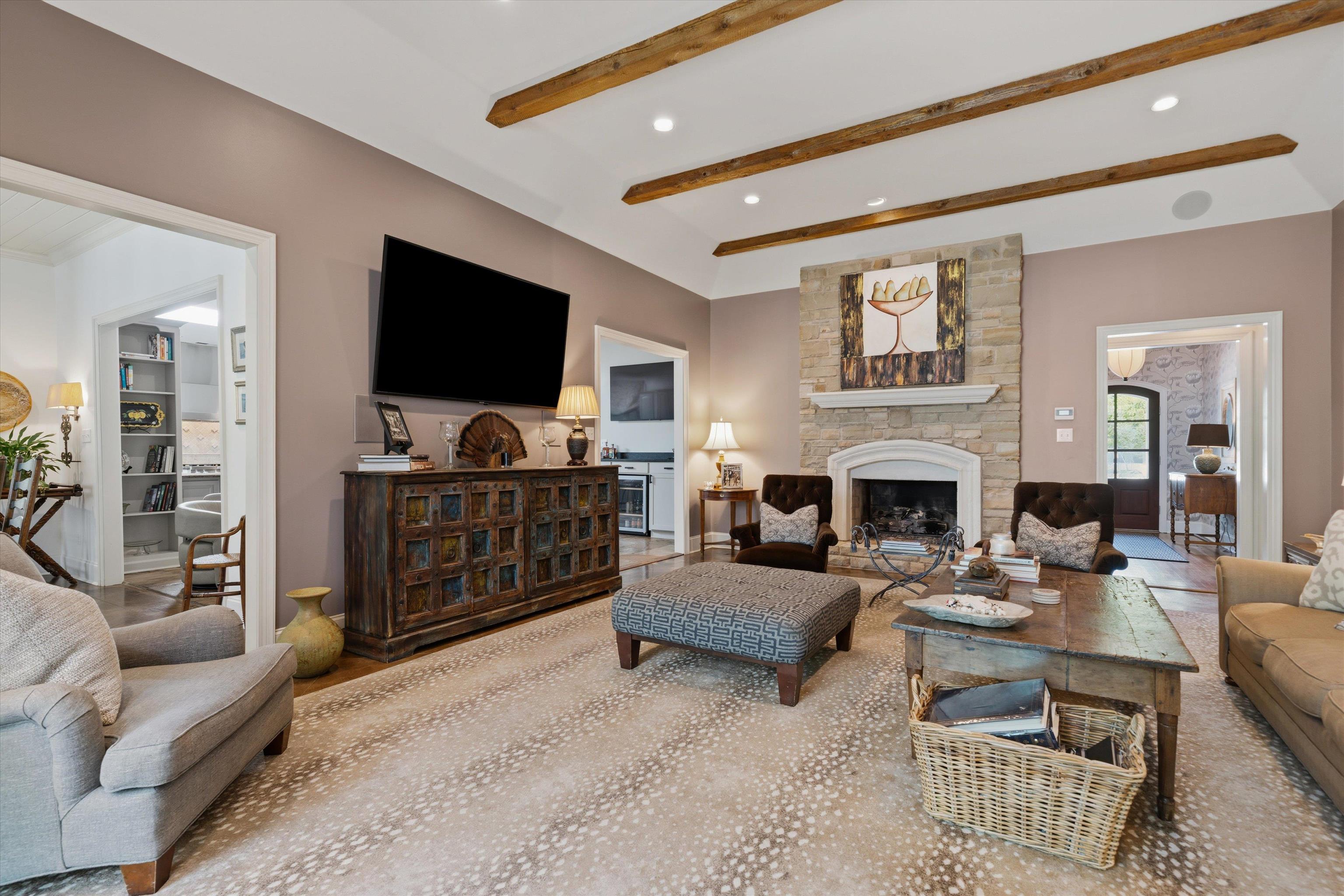 4710 Gwynne Road Memphis, TN 38117 - Photo 10 of 40 a living room with furniture and a flat screen tv