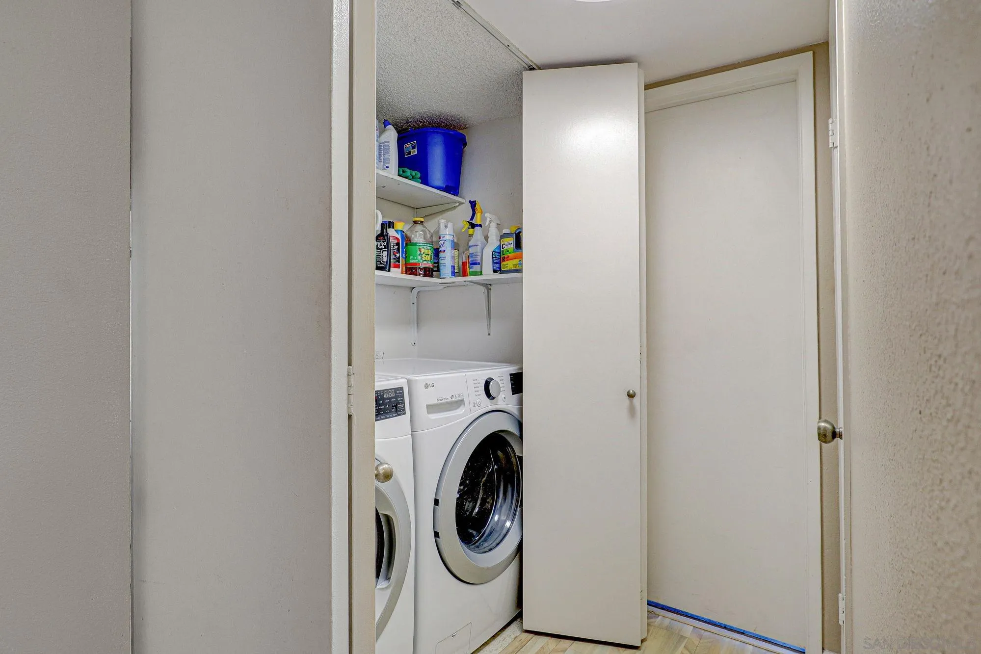 6385 Rancho Mission Road, Unit 6 San Diego, CA 92108 - Photo 21 of 26 a utility room with dryer and washer