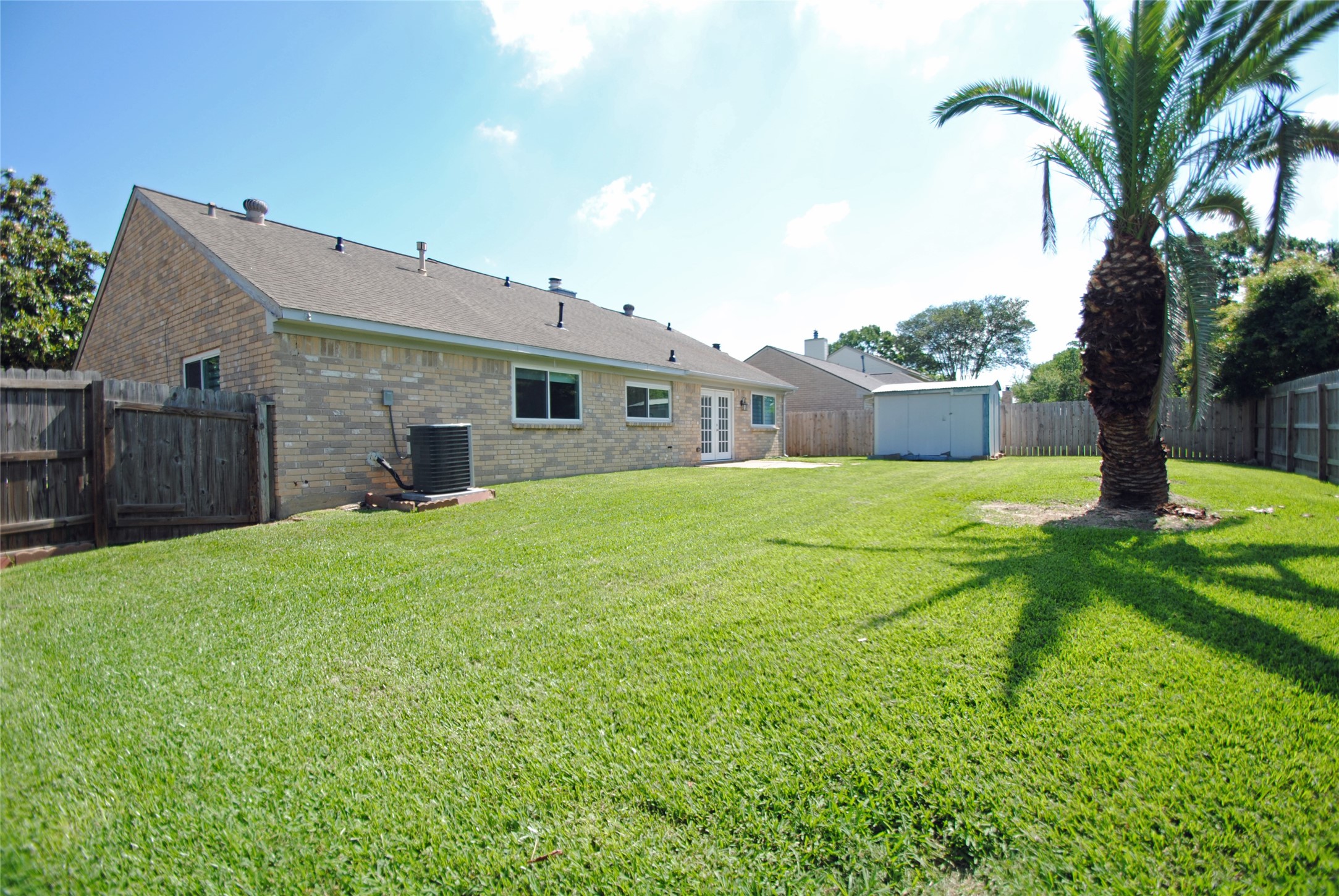 22831 John Rolfe Lane Katy, TX 77449 - Photo 34 of 34 a house that is sitting in the grass