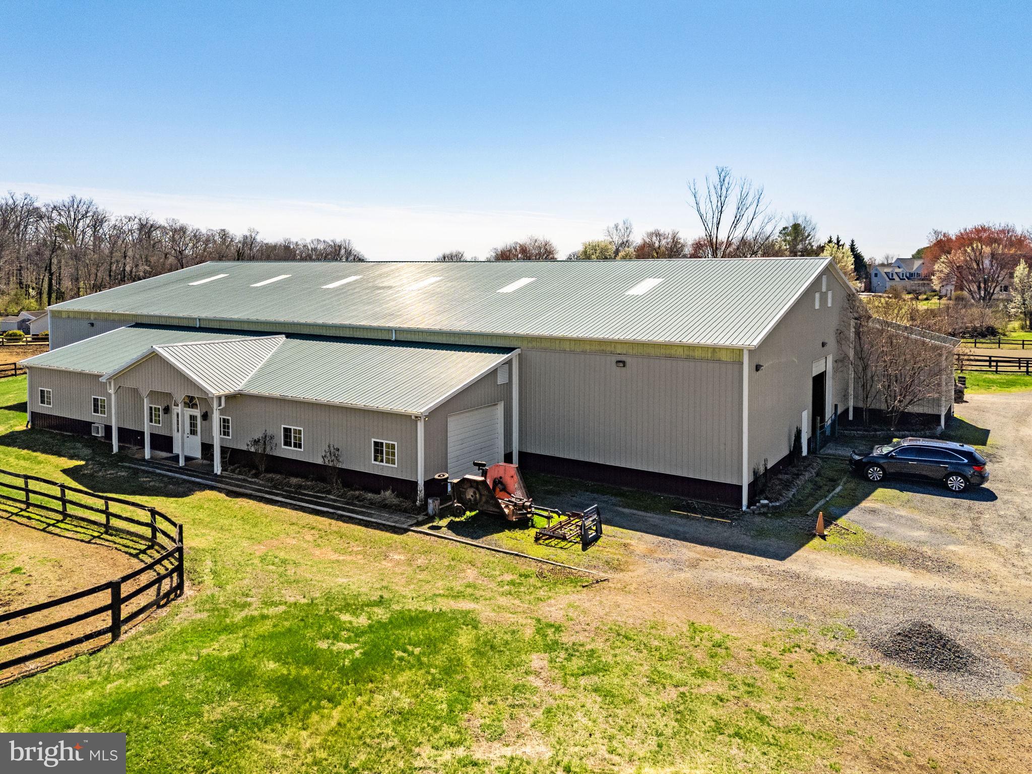 7453 Opal Road Warrenton, VA 20186 - Photo 27 of 53 a view of a house with swimming pool and sitting area