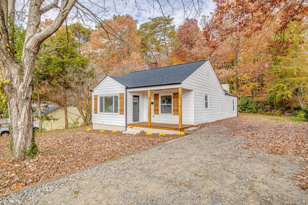 347 Linville Road Mount Airy, NC 27030 - Photo 2 of 25 Front of house with gravel driveway