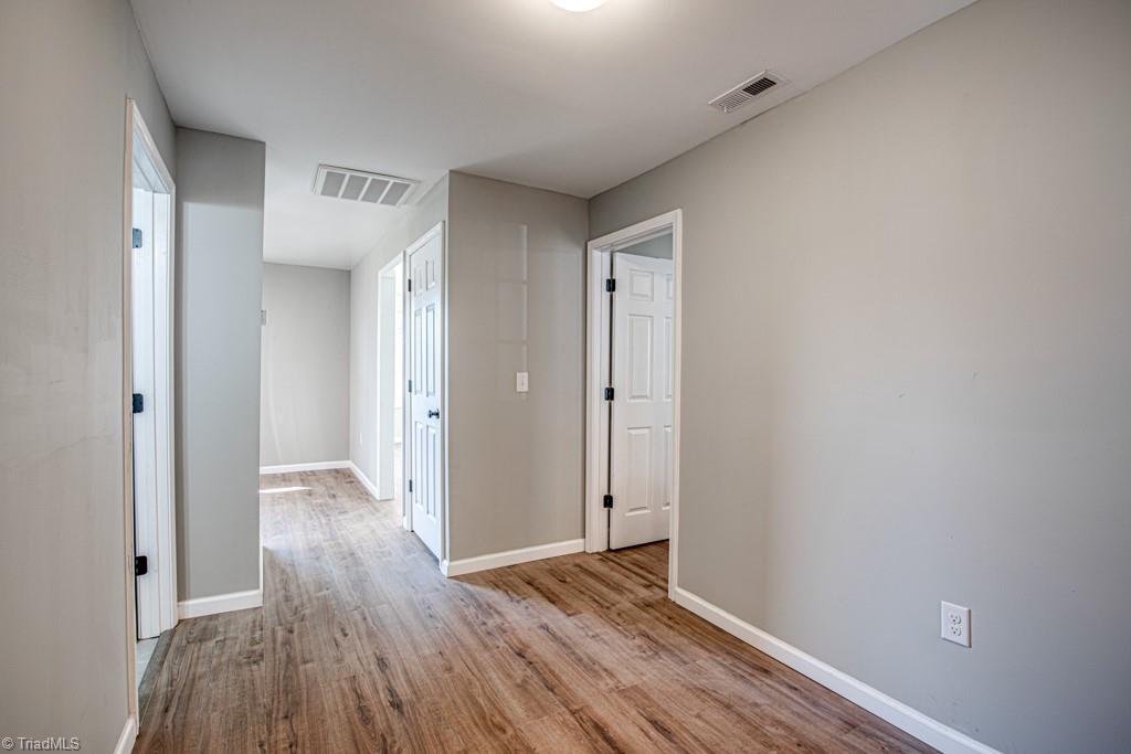 347 Linville Road Mount Airy, NC 27030 - Photo 15 of 25 Hallway view from primary bedroom door