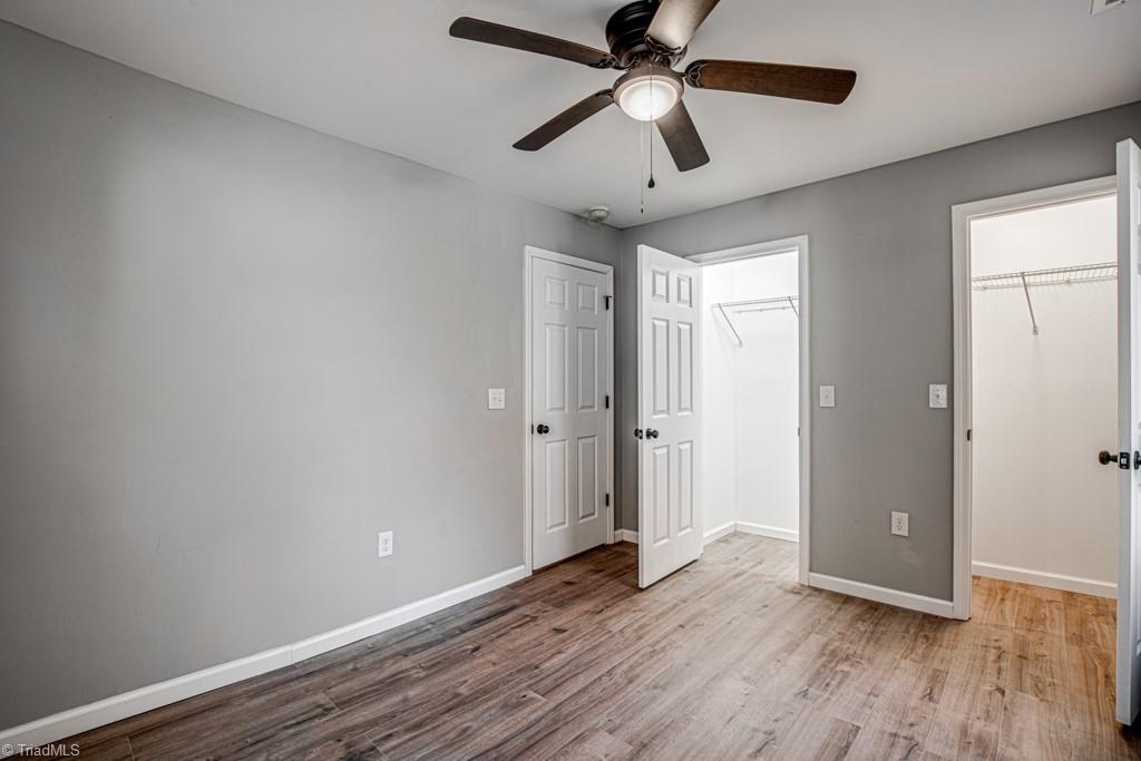 347 Linville Road Mount Airy, NC 27030 - Photo 18 of 25 Hall bedroom with closet doors open