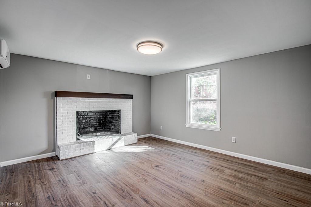 347 Linville Road Mount Airy, NC 27030 - Photo 20 of 25 Fireplace in primary bedroom