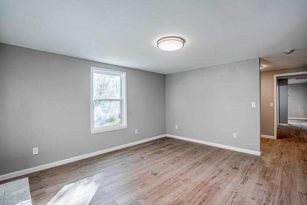 347 Linville Road Mount Airy, NC 27030 - Photo 21 of 25 Primary bedroom showing separation wall