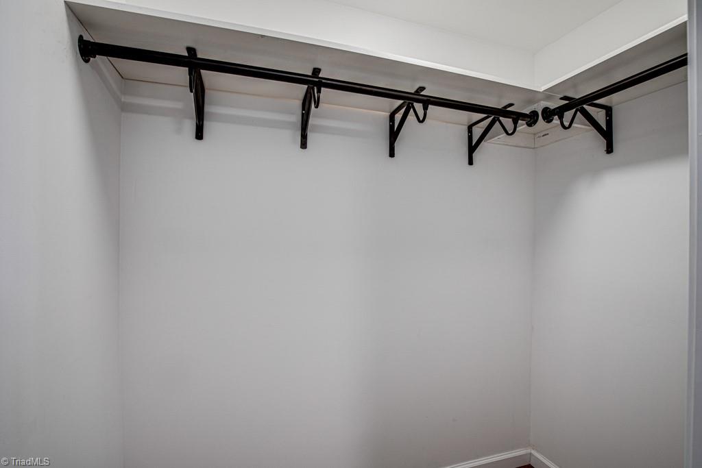 347 Linville Road Mount Airy, NC 27030 - Photo 23 of 25 Walk in closet in primary bedroom