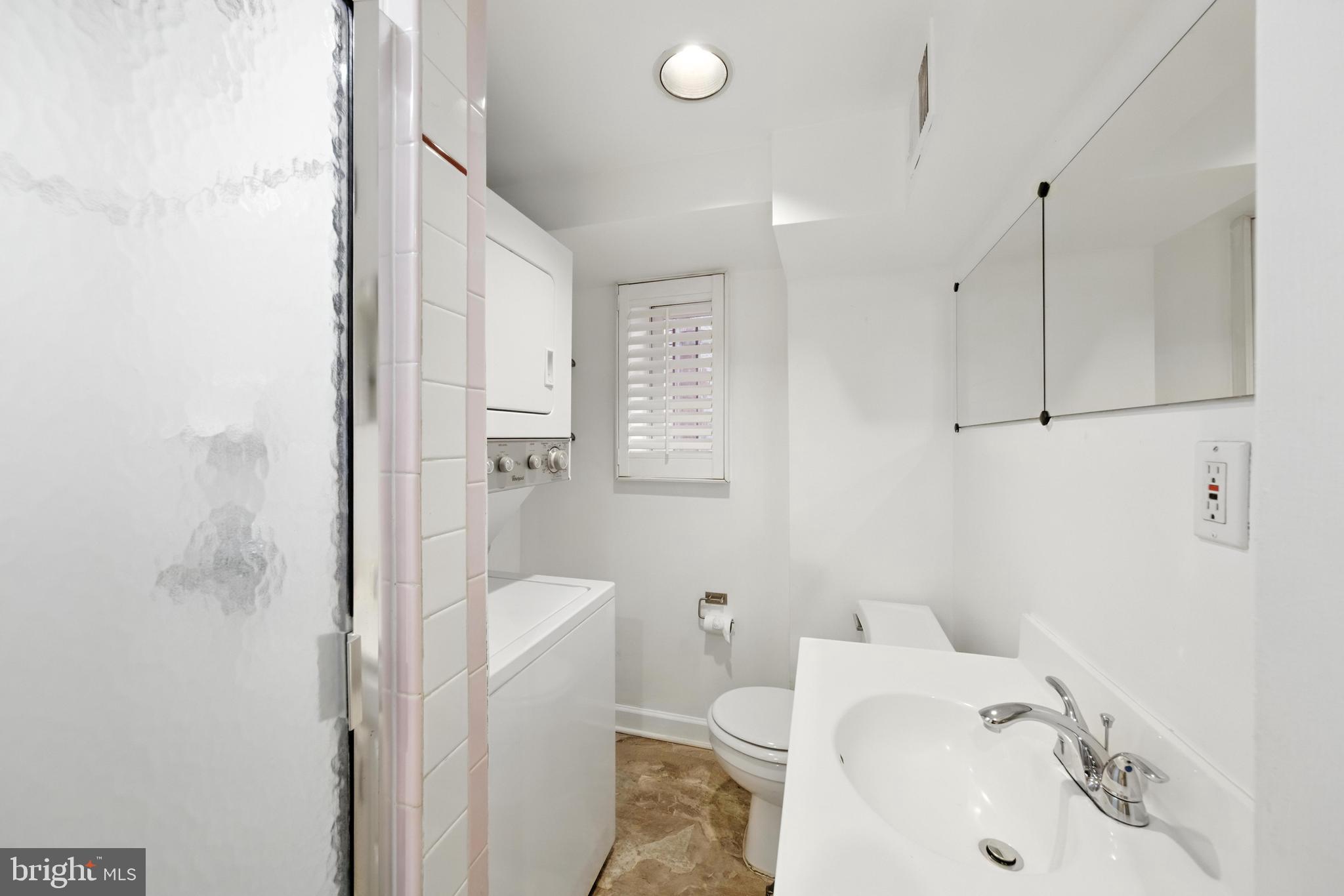 1763 U Street Northwest Washington, DC 20009 - Photo 29 of 29 a bathroom with a sink a toilet and shower