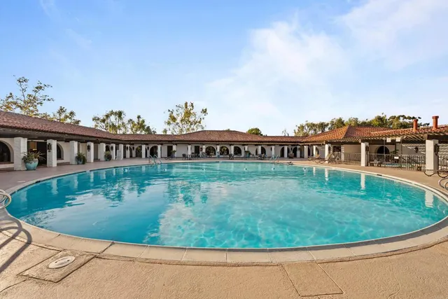 a view of swimming pool with a garden