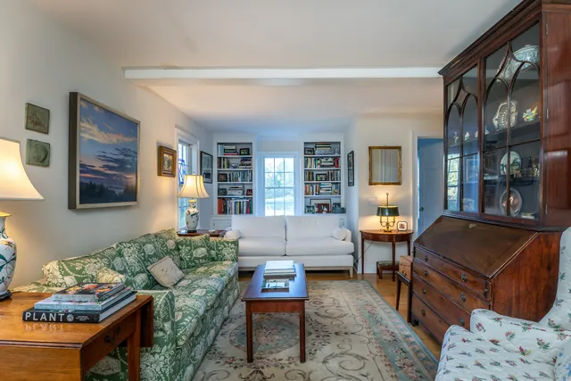 a living room with furniture and a couch