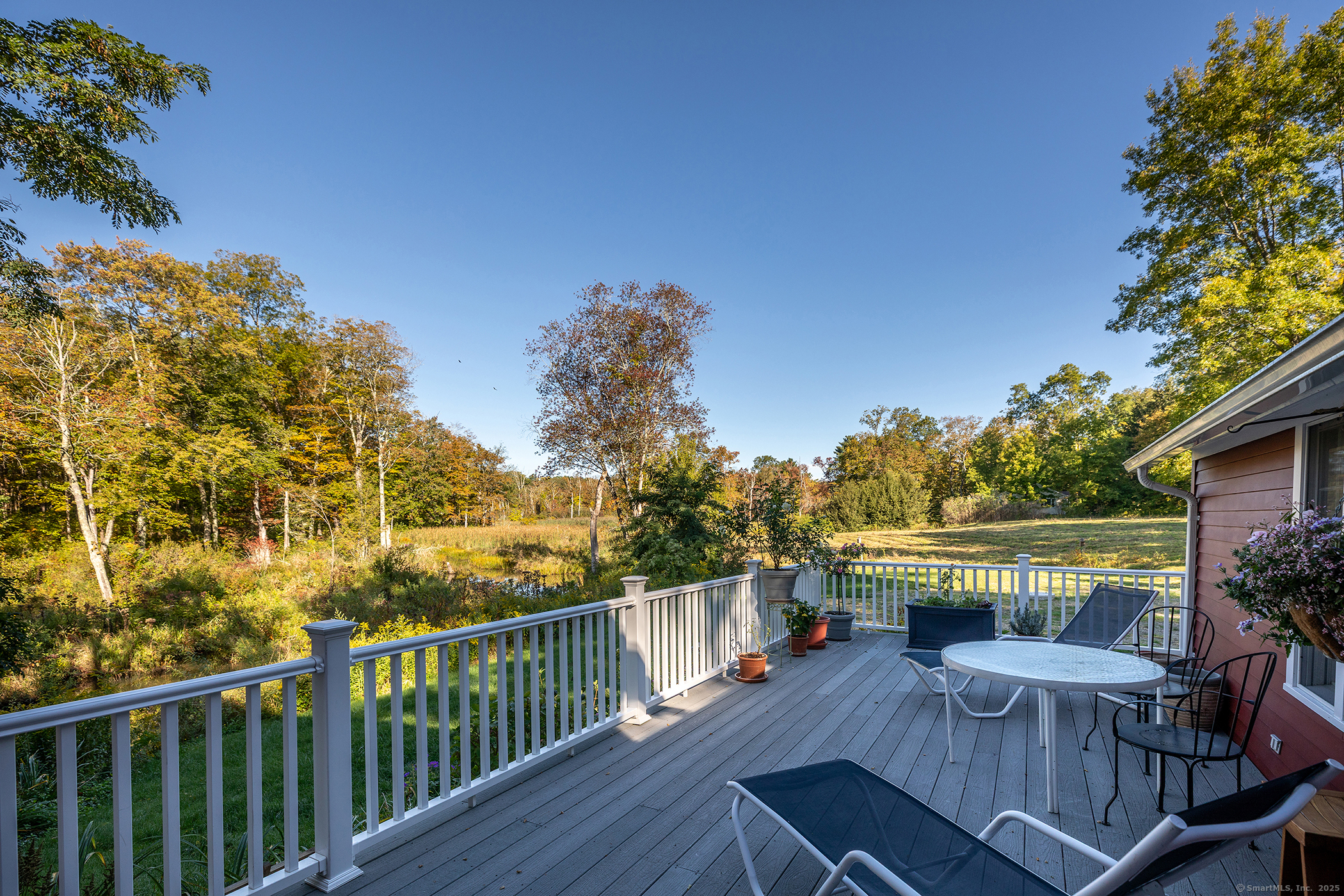 62 Brush Hill Road Litchfield, CT 06759 - Photo 2 of 23 a view of a balcony with furniture