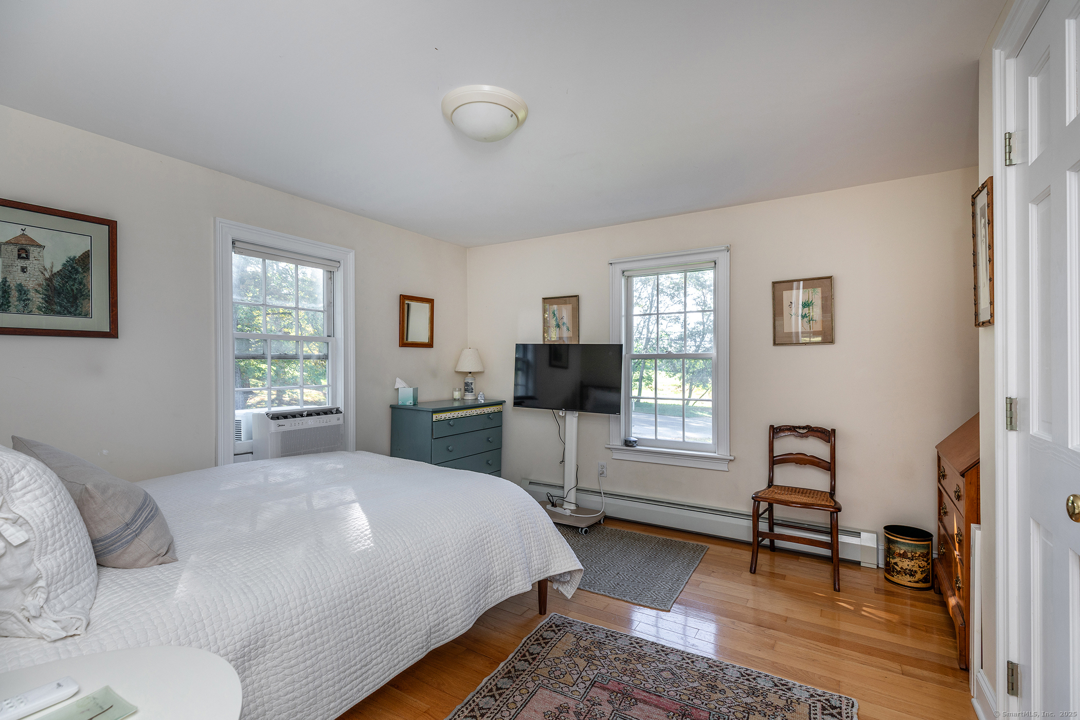 62 Brush Hill Road Litchfield, CT 06759 - Photo 21 of 23 a bedroom with a bed and a window