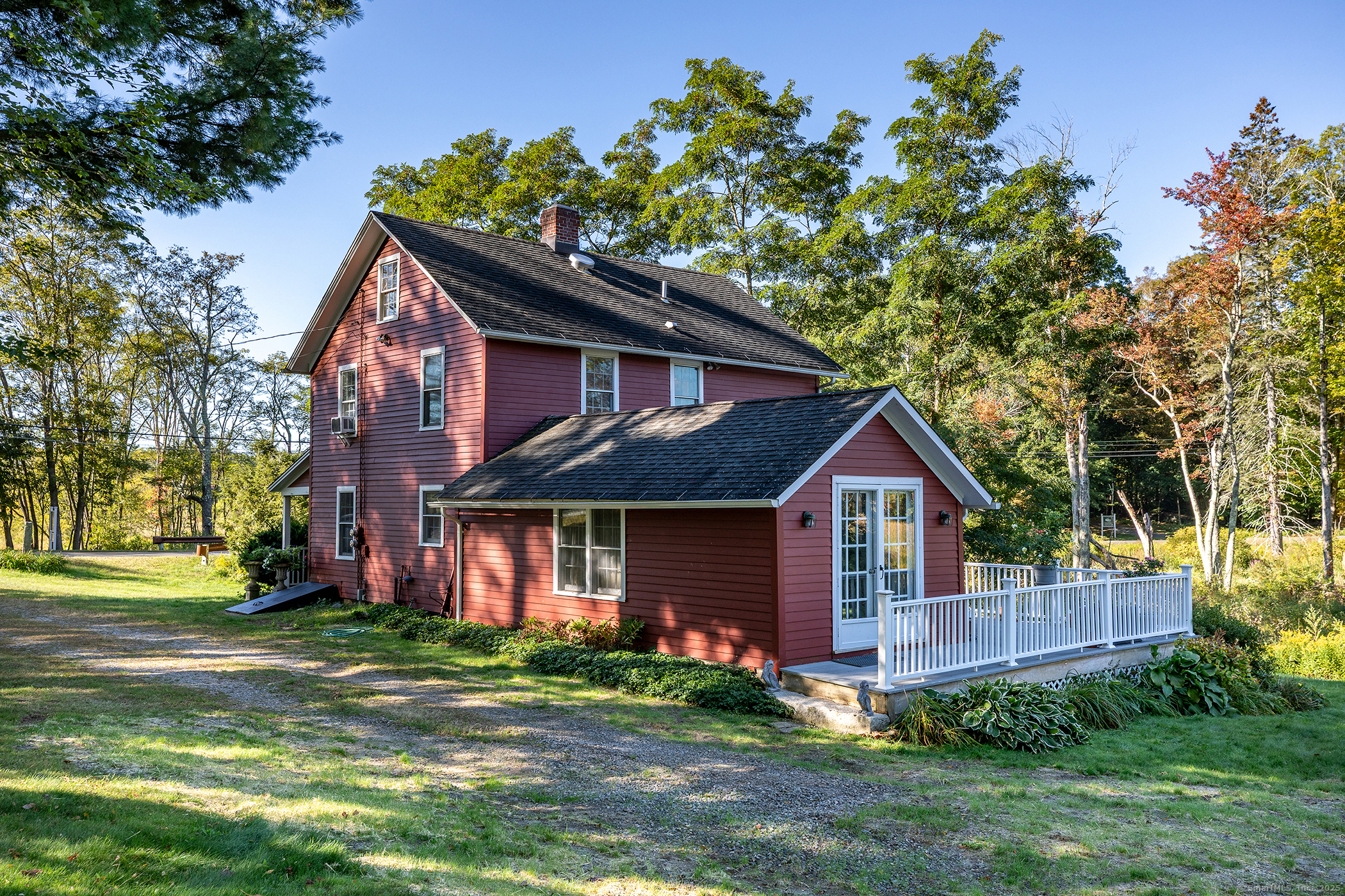 62 Brush Hill Road Litchfield, CT 06759 - Photo 10 of 23 a front view of a house with garden