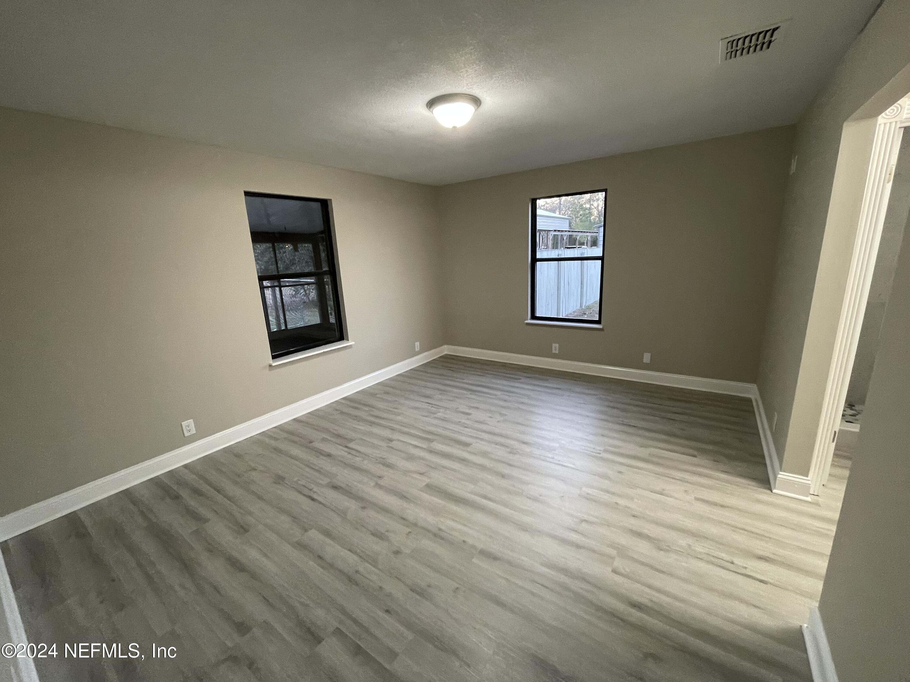 4535 Chipmunk Road Middleburg, FL 32068 - Photo 13 of 26 an empty room with windows