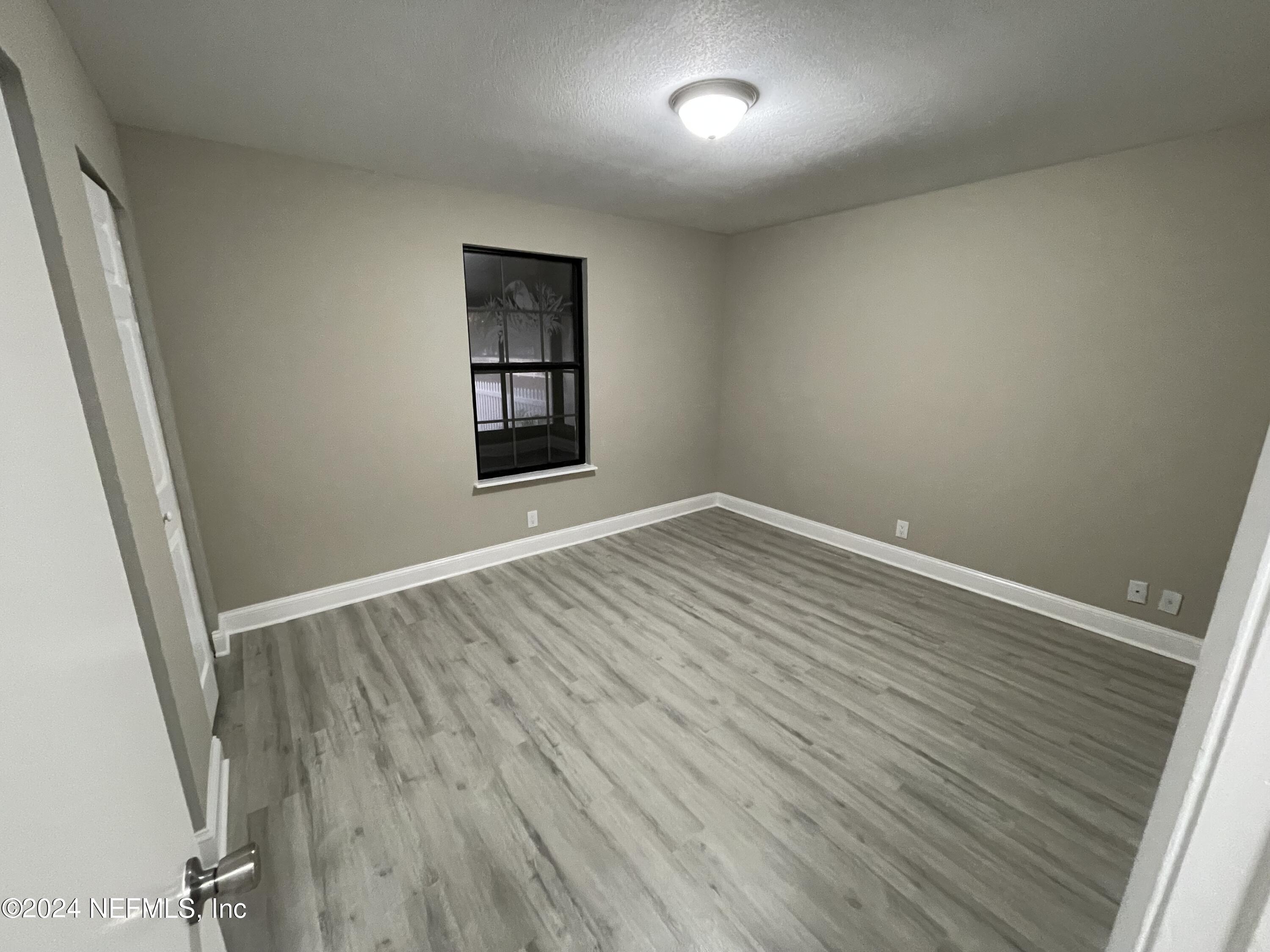 4535 Chipmunk Road Middleburg, FL 32068 - Photo 18 of 26 an empty room with windows