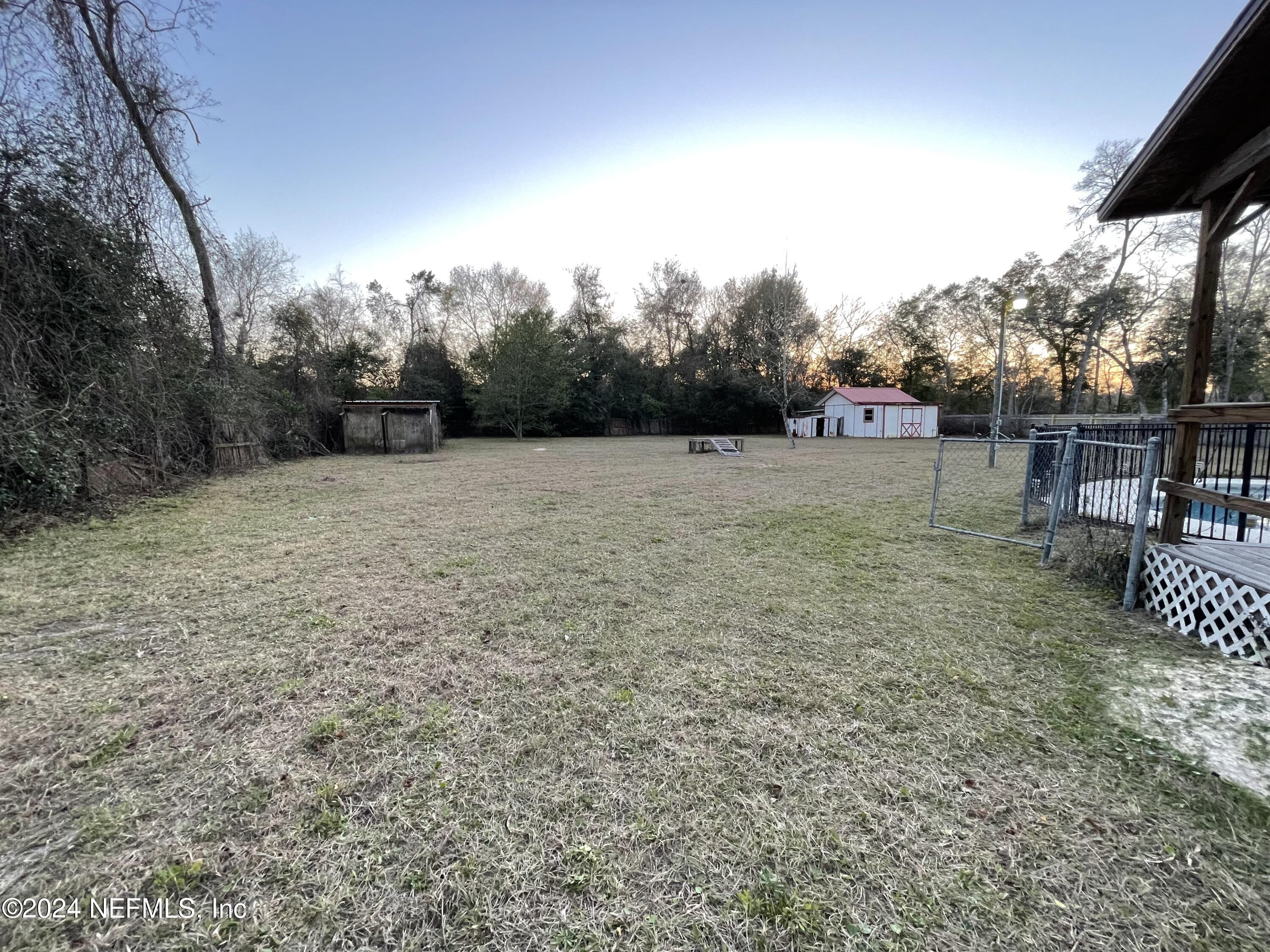 4535 Chipmunk Road Middleburg, FL 32068 - Photo 22 of 26 a view of an outdoor space and yard