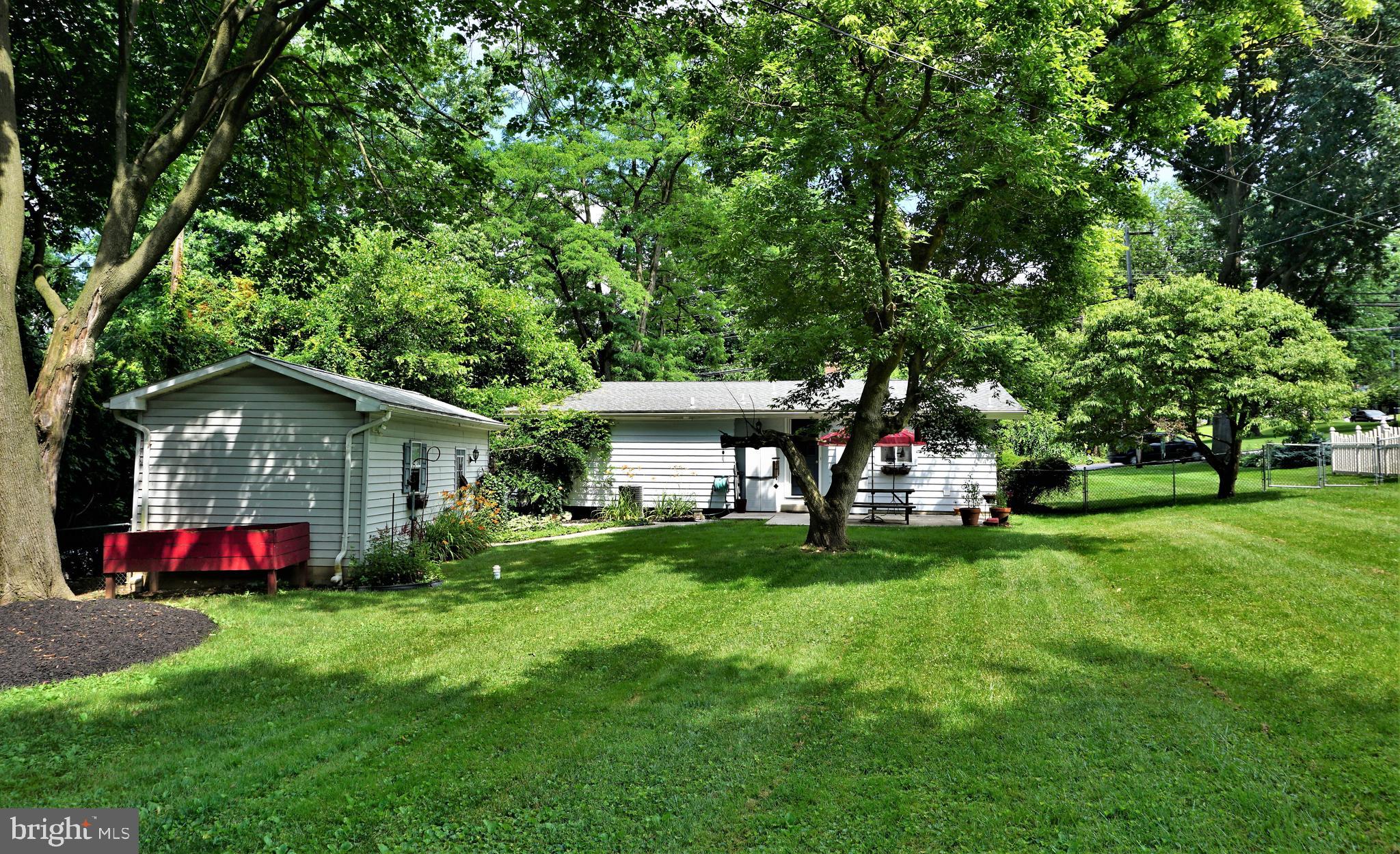 578 Edgewood Road York, PA 17402 - Photo 11 of 43 Level Yard with mature trees