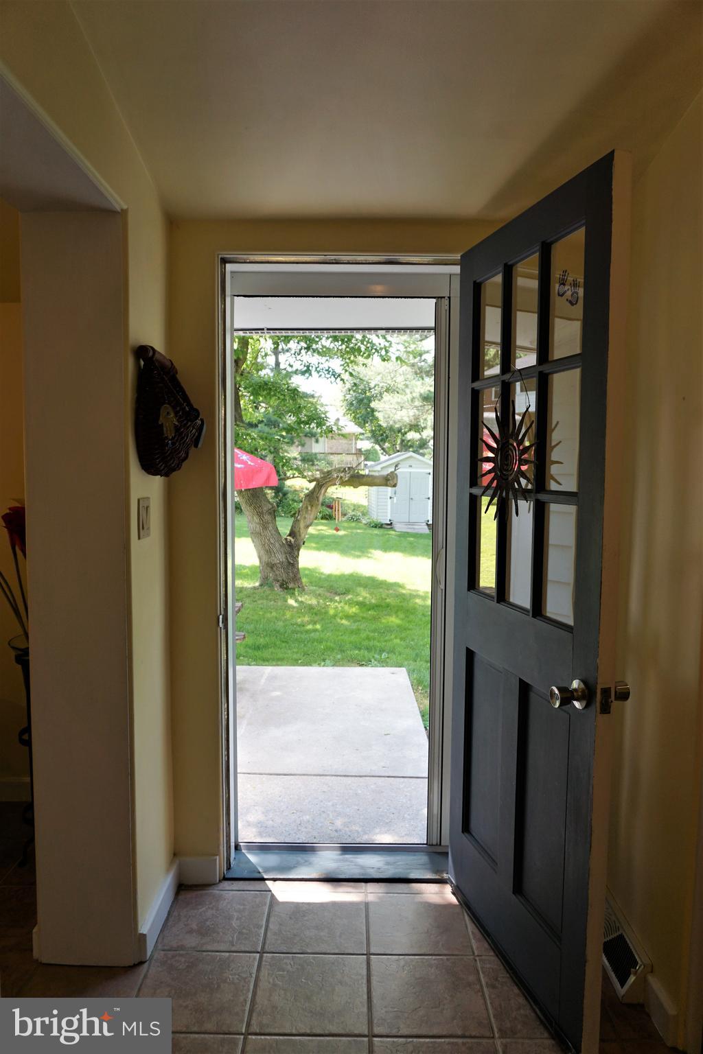 578 Edgewood Road York, PA 17402 - Photo 37 of 43 Back door off kitchen patio in back yard