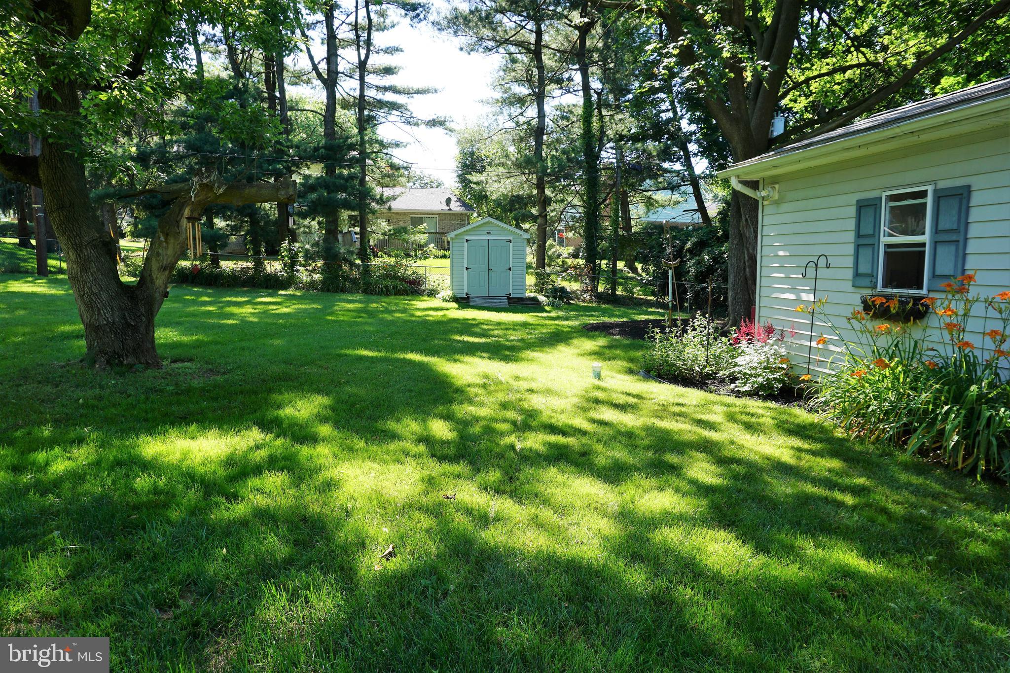 578 Edgewood Road York, PA 17402 - Photo 39 of 43 Inviting sun dappled yard