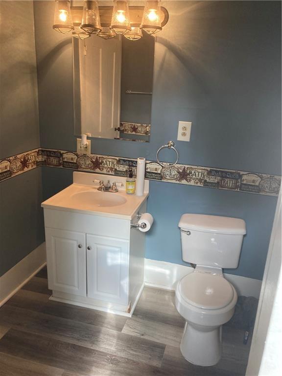 12 Lake Road Hadley, PA 16130 - Photo 10 of 10 a bathroom with a toilet sink and mirror
