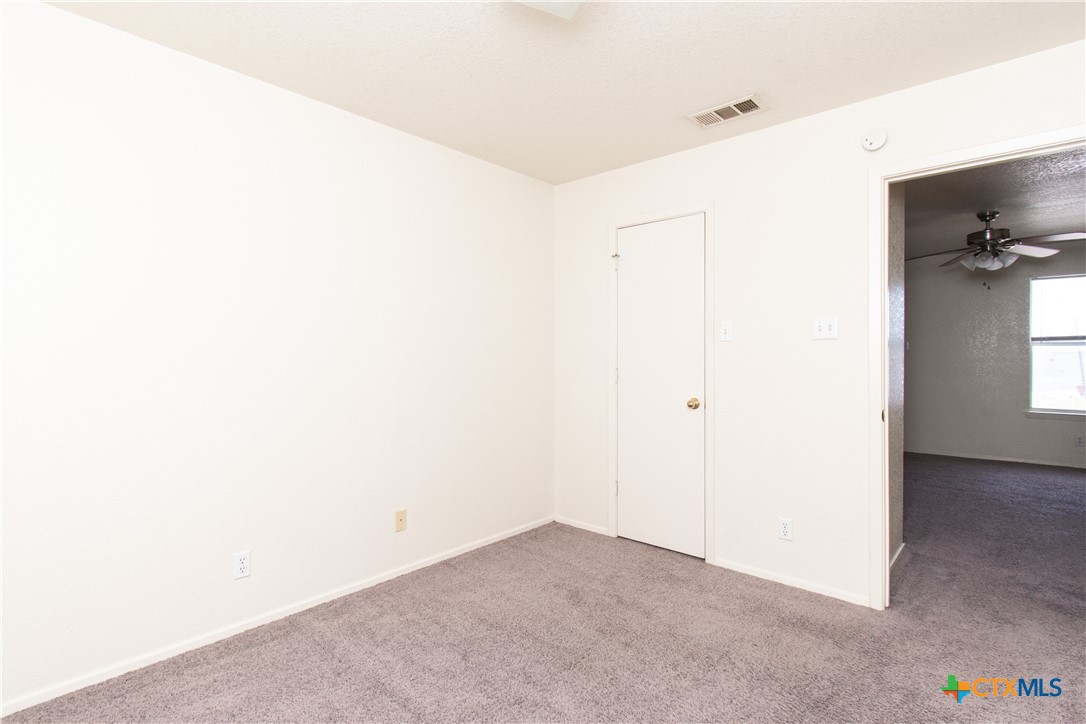 2014 Cedarhill Drive, Unit C Killeen, TX 76543 - Photo 11 of 12 a view of a room with a hallway