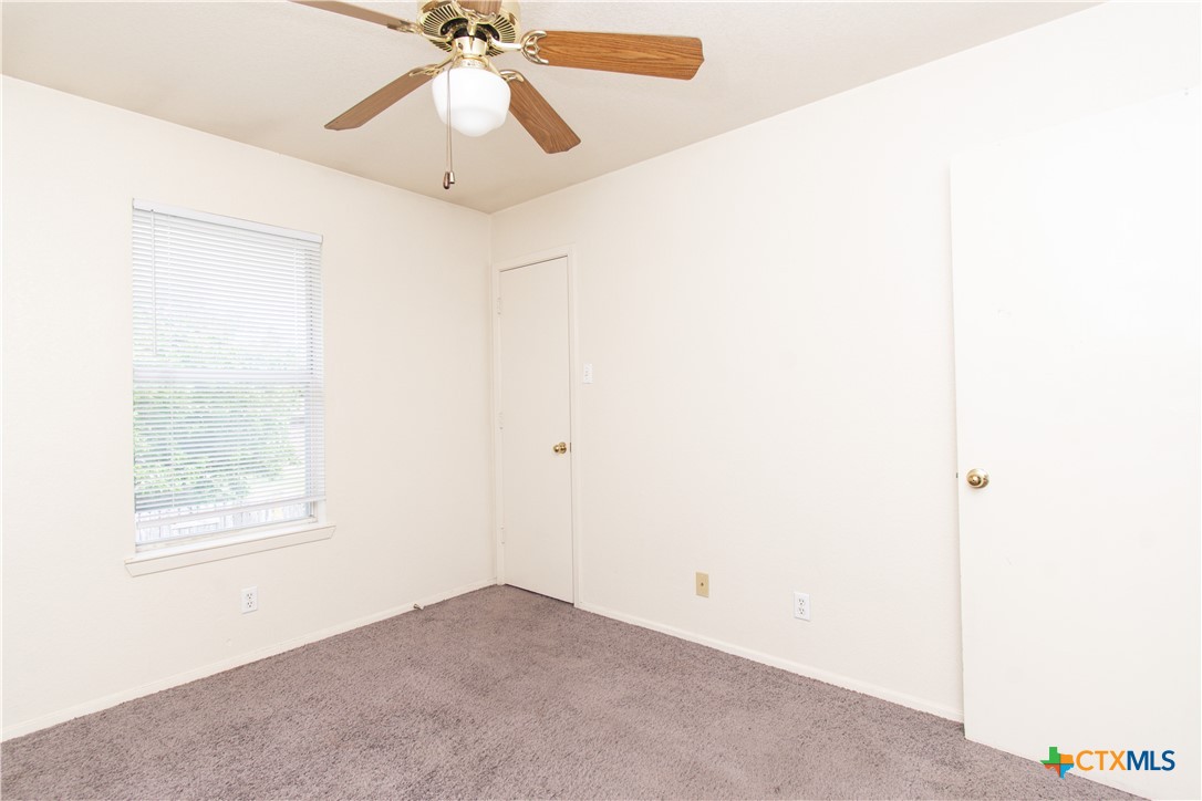 2014 Cedarhill Drive, Unit C Killeen, TX 76543 - Photo 7 of 12 a view of an empty room with a window