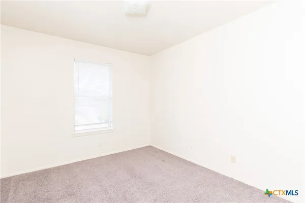 a view of a room with a hallway