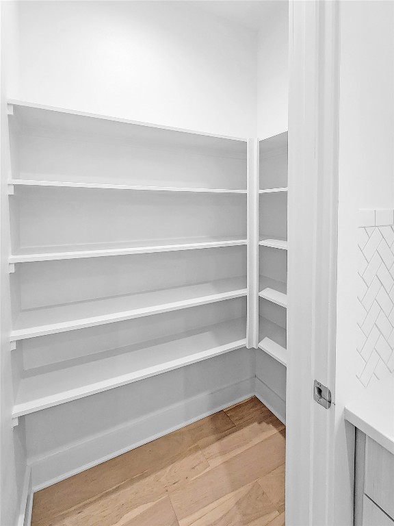 3807 Threadgill Street Austin, TX 78723 - Photo 10 of 36 a view of walk in closet with empty racks