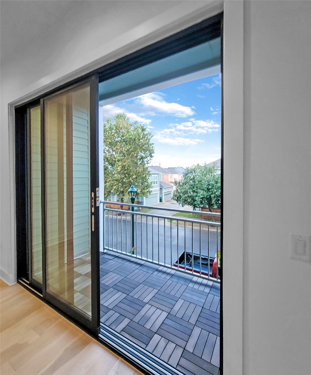 3807 Threadgill Street Austin, TX 78723 - Photo 12 of 36 a view of a porch with wooden floor
