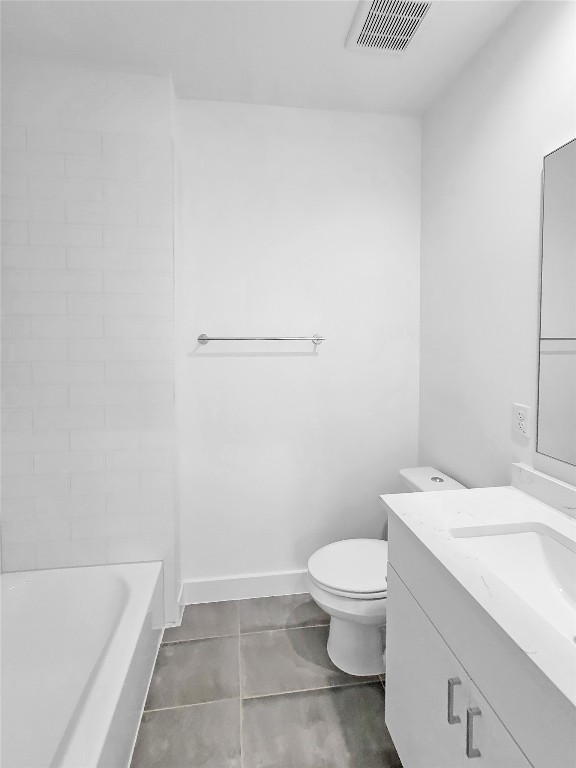 3807 Threadgill Street Austin, TX 78723 - Photo 18 of 36 a bathroom with a granite countertop sink a toilet and a bathtub