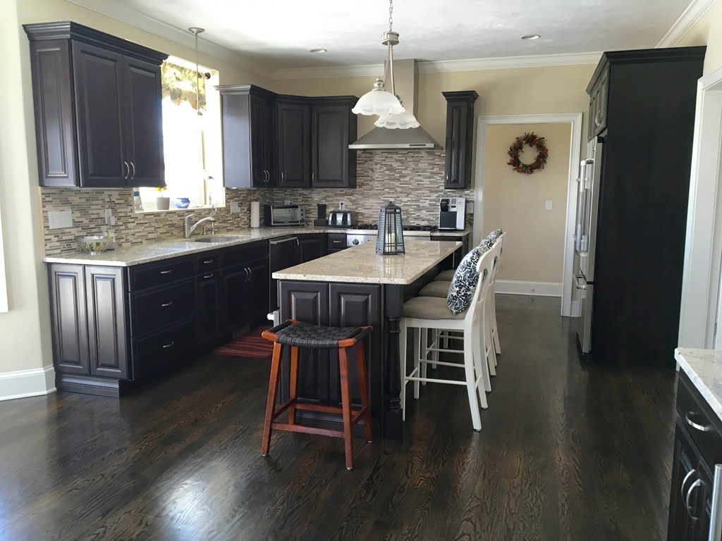 49 Haynes Hill Road Brimfield, MA 01010 - Photo 3 of 27 a kitchen with a table chairs sink and cabinets