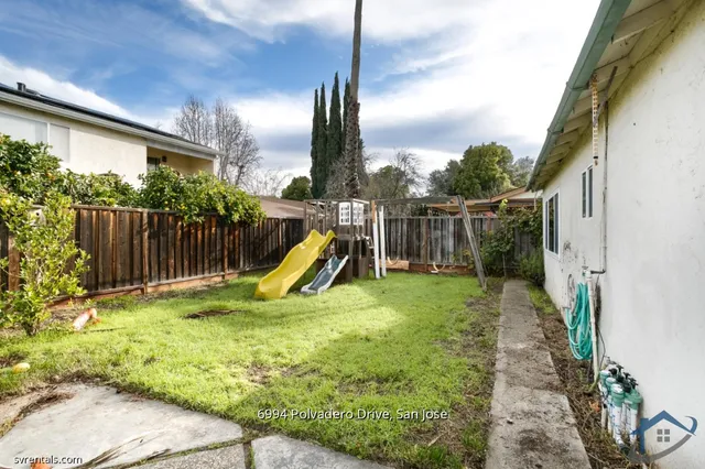 a view of a garden with a slide