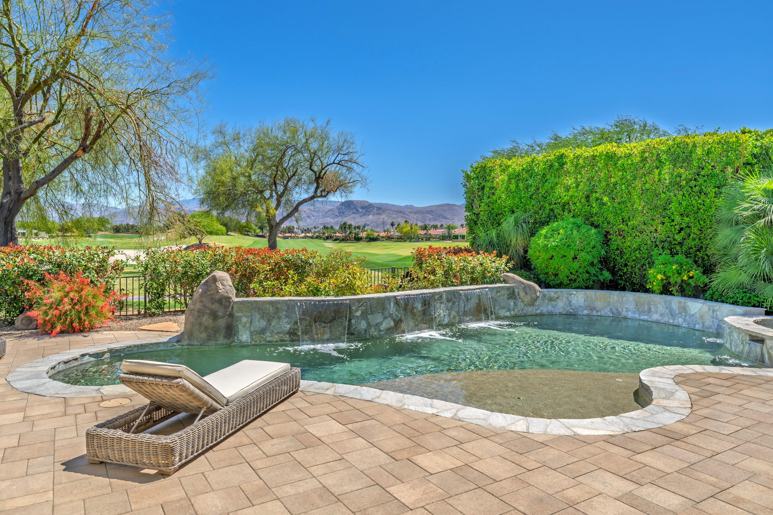 306 Loch Lomond Road Rancho Mirage, CA 92270 - Photo 1 of 60 a view of a yard with furniture