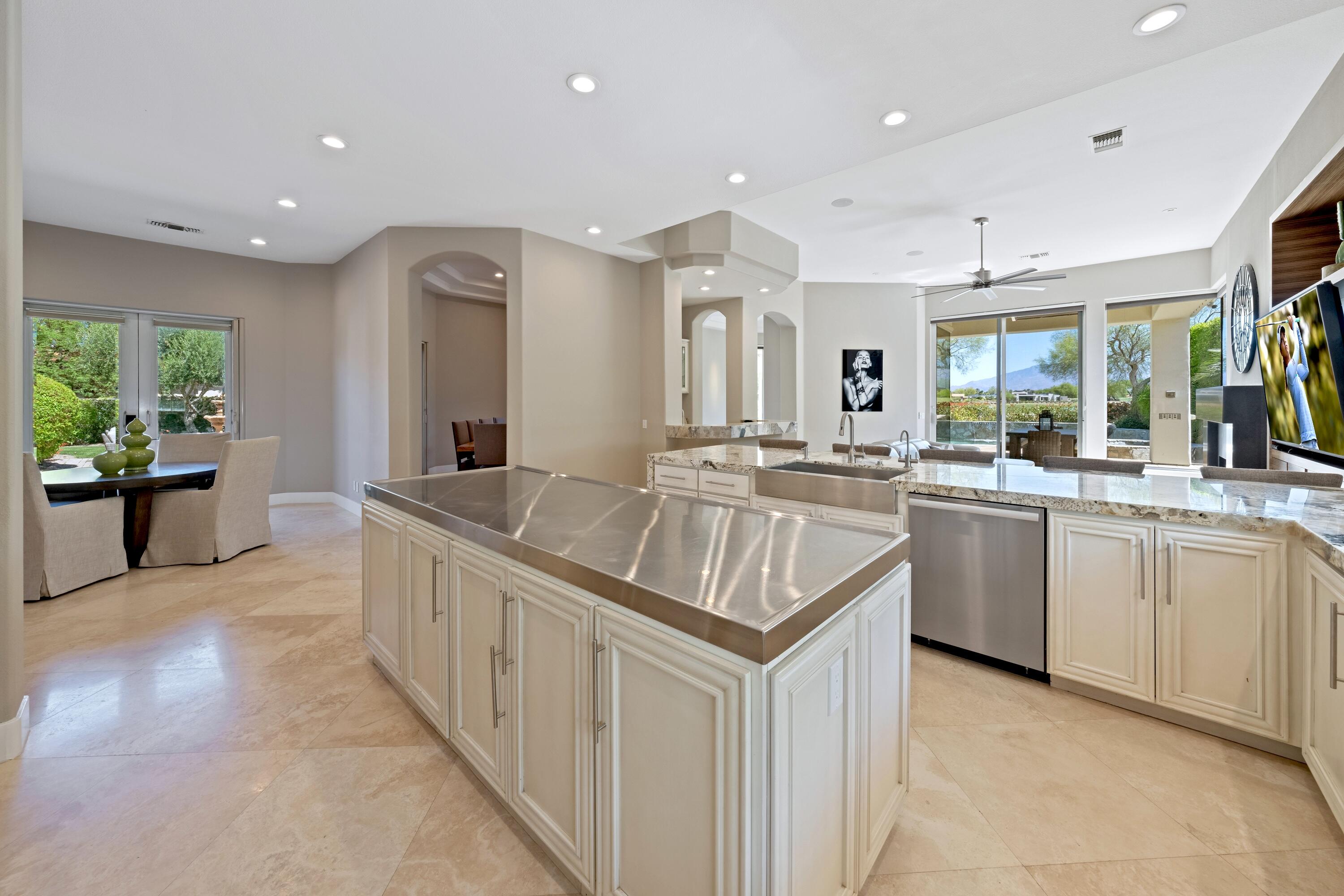306 Loch Lomond Road Rancho Mirage, CA 92270 - Photo 21 of 60 a kitchen with sink stove and refrigerator