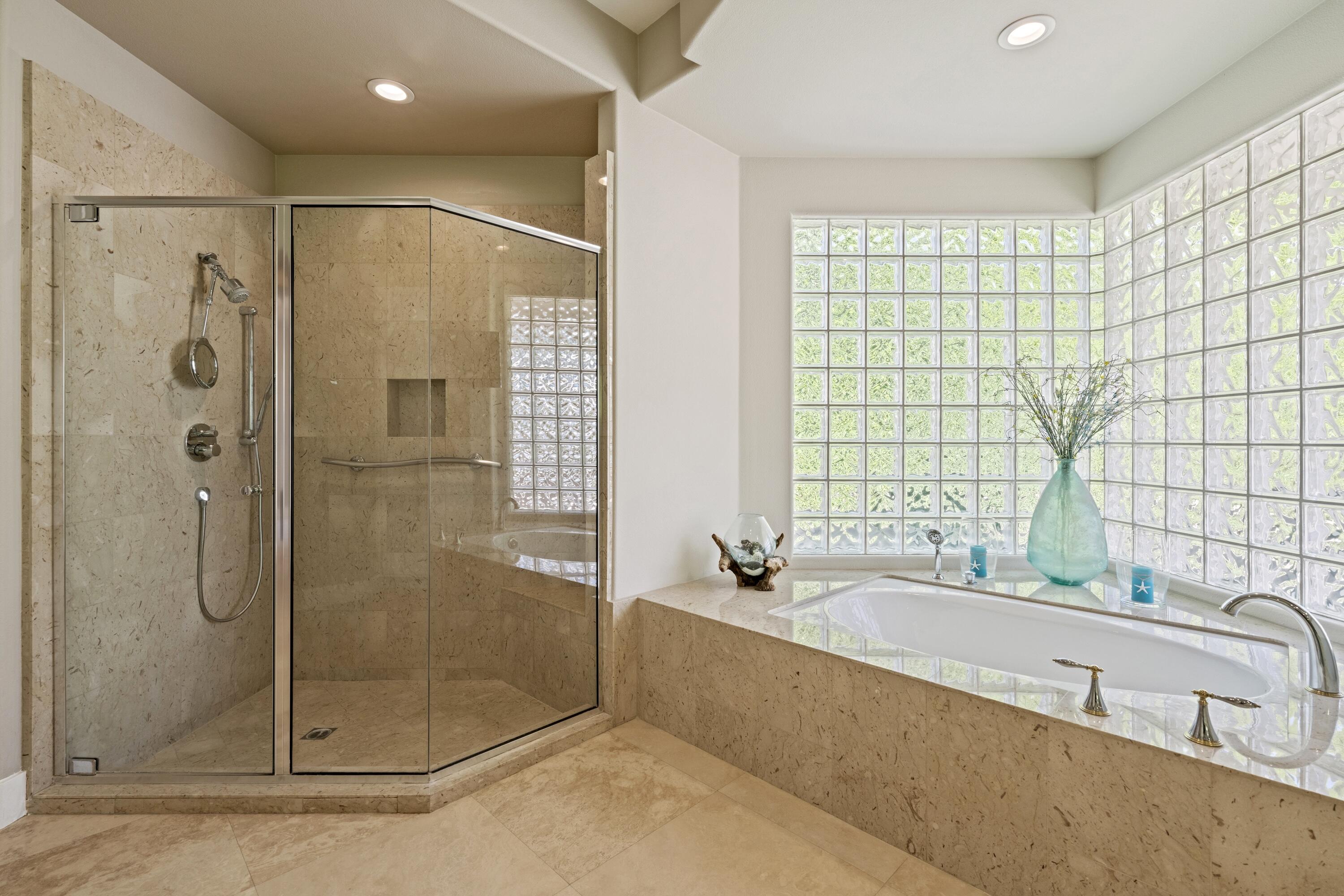 306 Loch Lomond Road Rancho Mirage, CA 92270 - Photo 28 of 60 a bathroom with a shower and a sink mirror