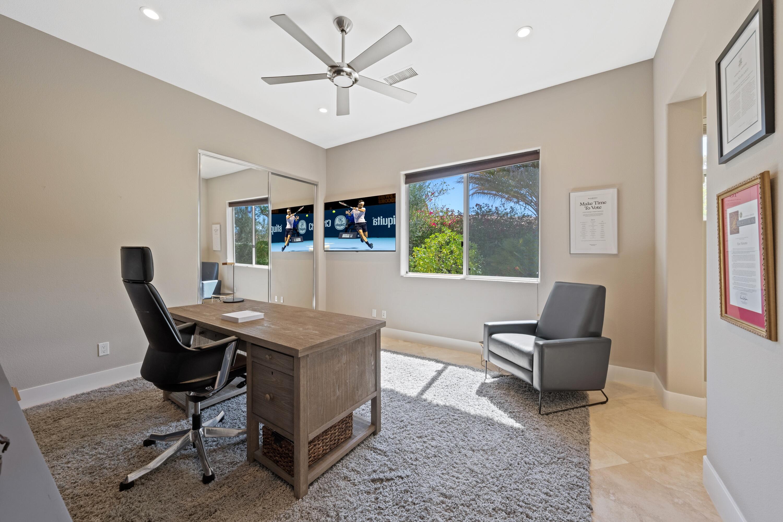 306 Loch Lomond Road Rancho Mirage, CA 92270 - Photo 32 of 60 a view of a workspace with furniture and a window