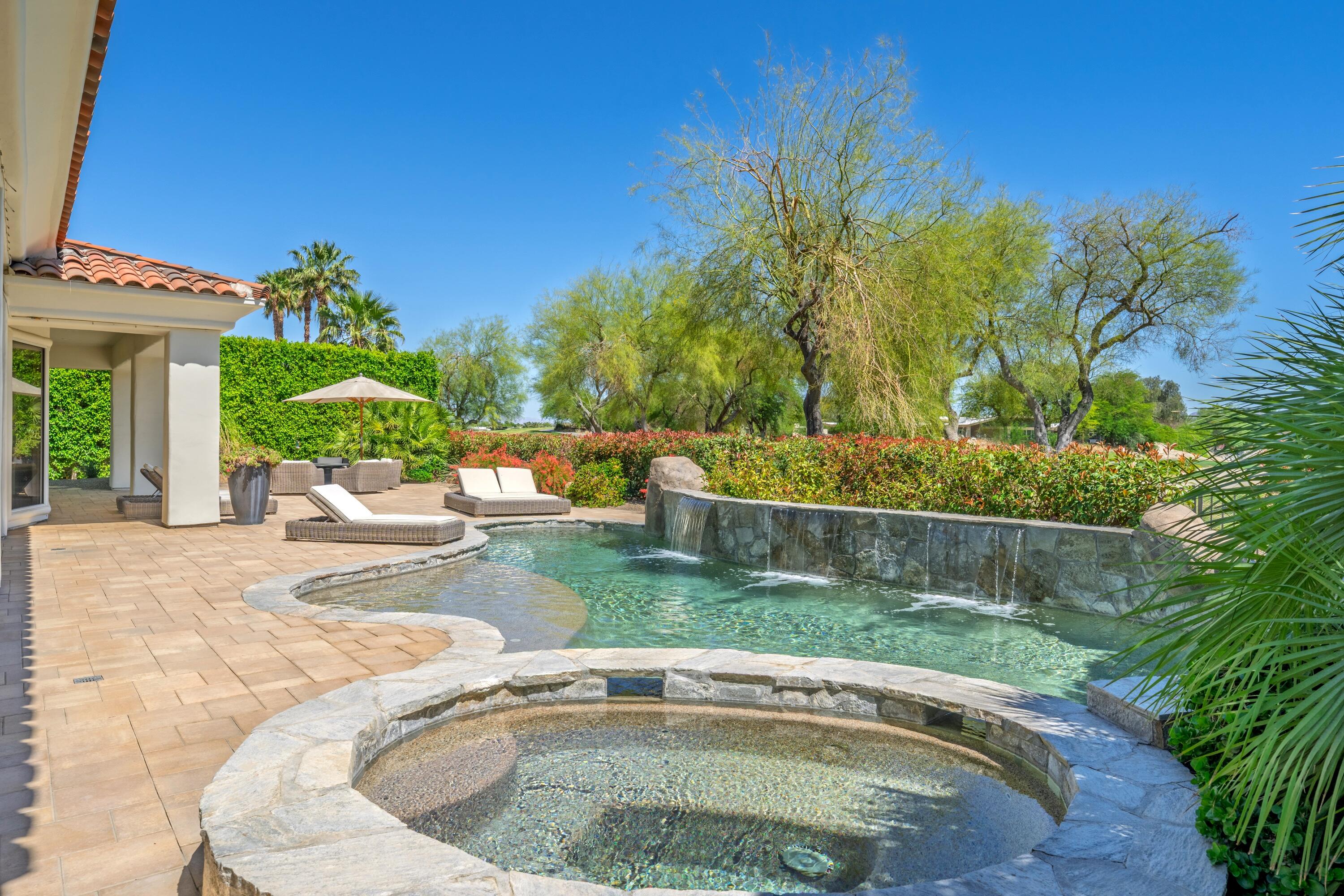 306 Loch Lomond Road Rancho Mirage, CA 92270 - Photo 44 of 60 a view of a backyard with swimming pool