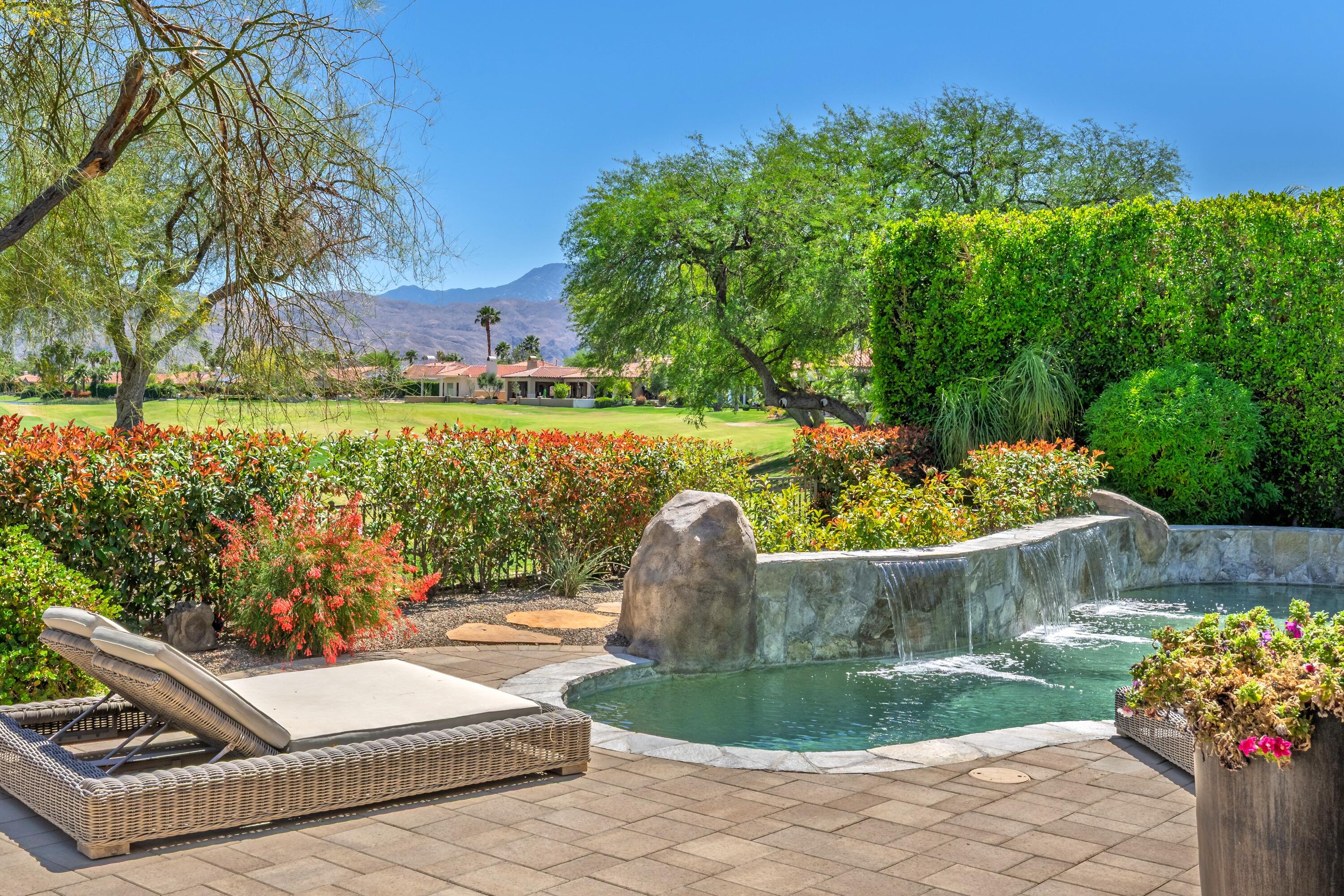 306 Loch Lomond Road Rancho Mirage, CA 92270 - Photo 48 of 60 a view of a chair and table on the terrace