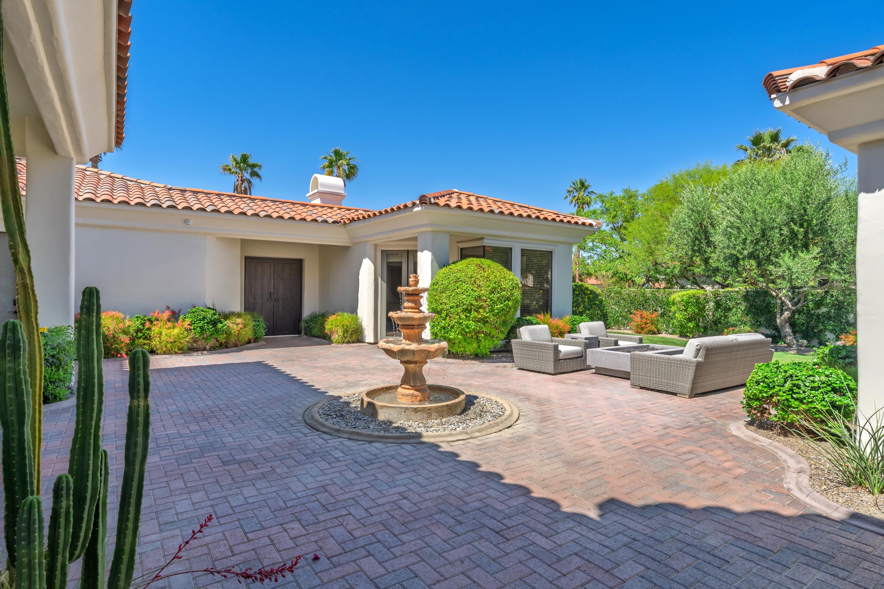 306 Loch Lomond Road Rancho Mirage, CA 92270 - Photo 5 of 60 a view of a house with backyard and sitting area