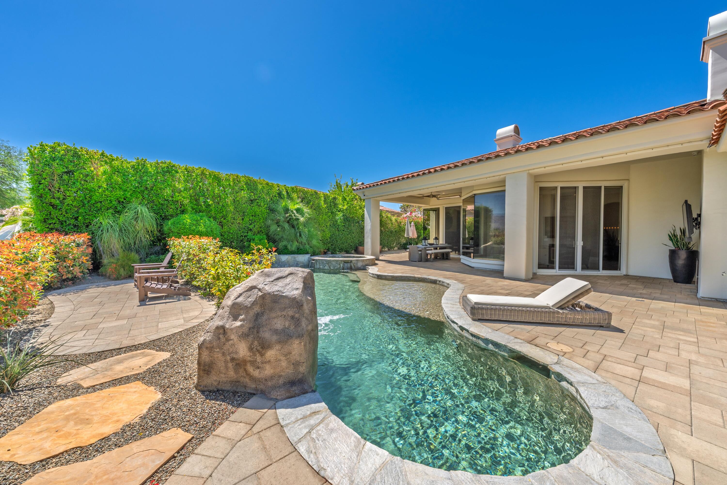 306 Loch Lomond Road Rancho Mirage, CA 92270 - Photo 51 of 60 a view of a swimming pool with a patio