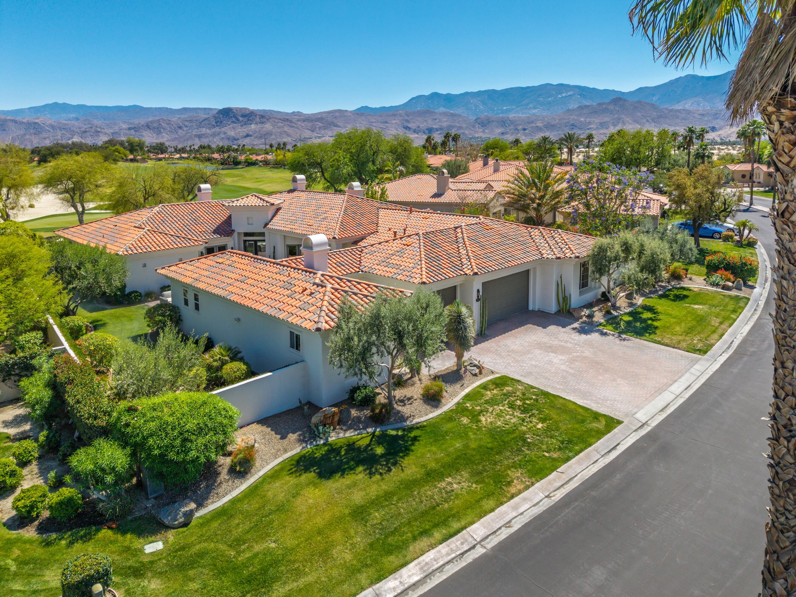 306 Loch Lomond Road Rancho Mirage, CA 92270 - Photo 53 of 60 an aerial view of a house with a garden