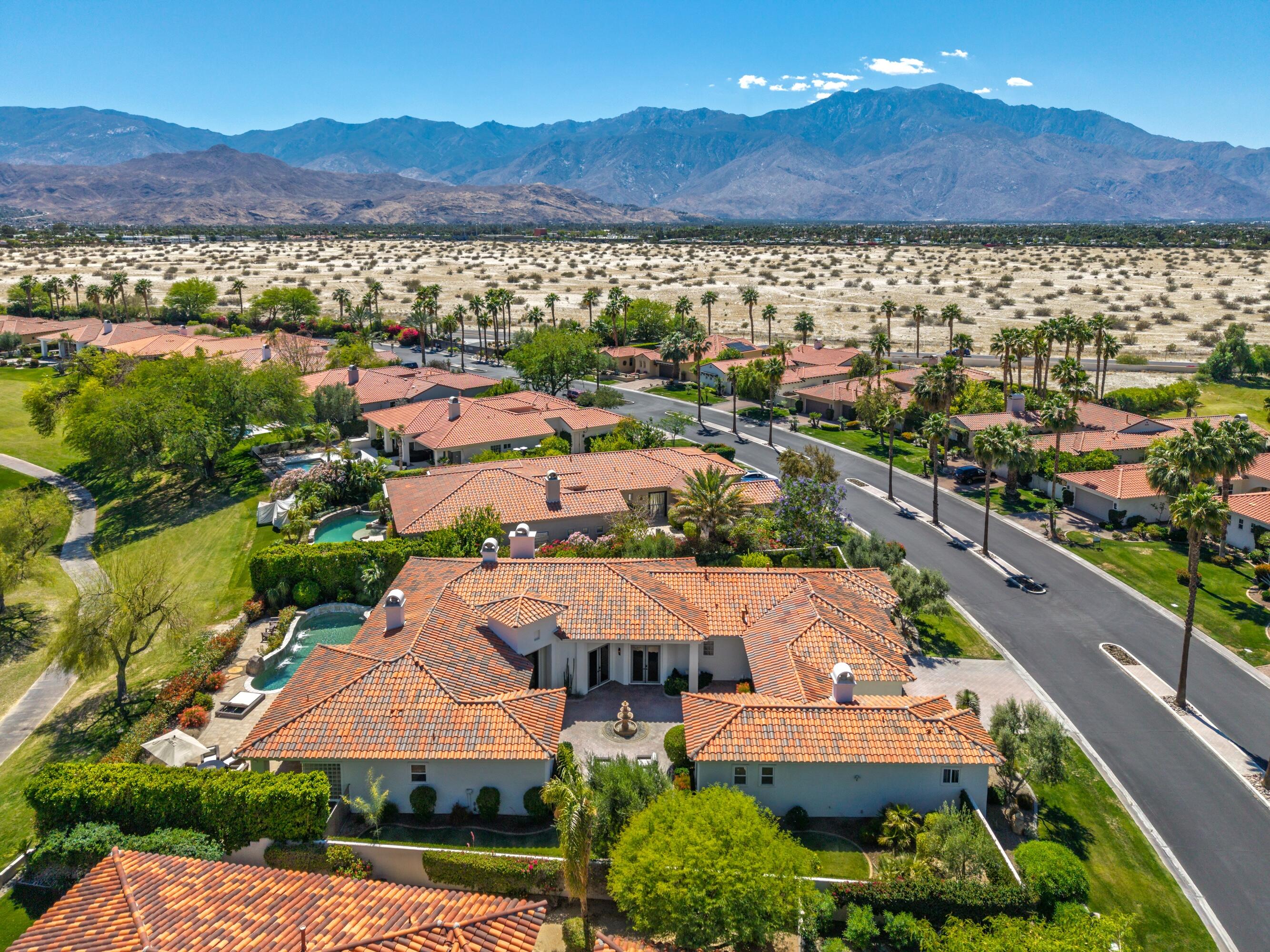 306 Loch Lomond Road Rancho Mirage, CA 92270 - Photo 54 of 60 an aerial view of residential houses with outdoor space and river
