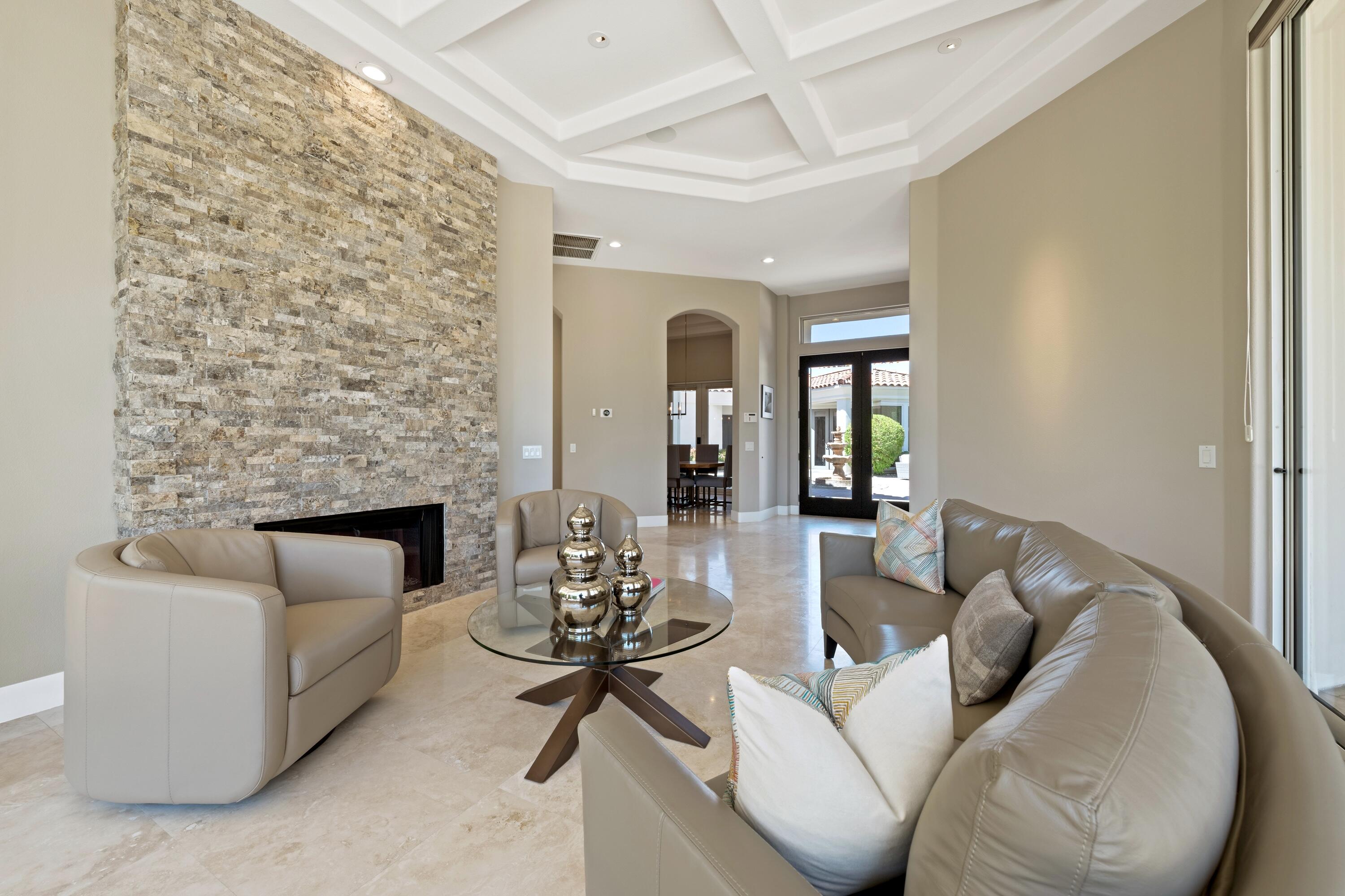 306 Loch Lomond Road Rancho Mirage, CA 92270 - Photo 10 of 60 a living room with furniture and a fireplace