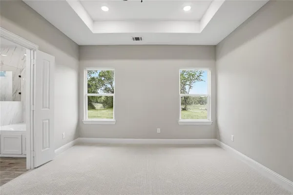 an empty room with windows