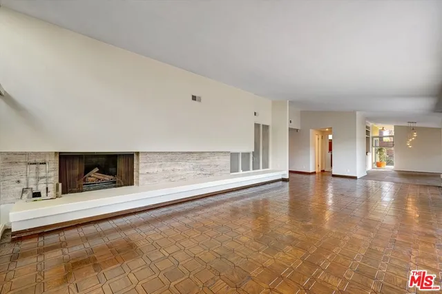 a kitchen with stainless steel appliances granite countertop a sink and a stove