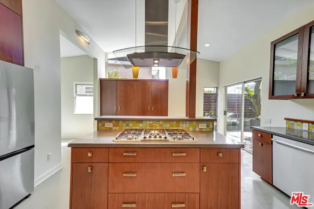 a bathroom with a sink a toilet and bathtub